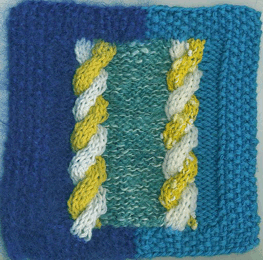 Intarsia knitted cables
